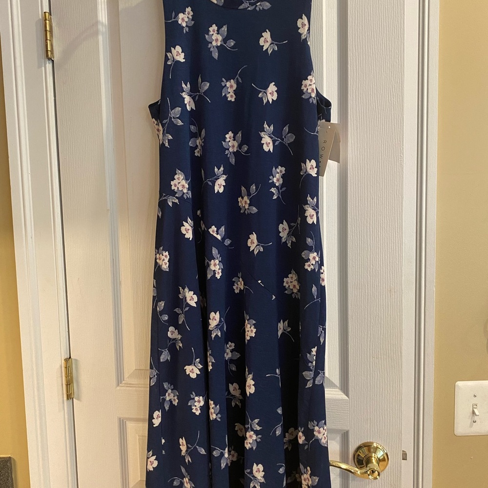 Beautiful Navy blue dress with tags. Sleeveless in XL size
